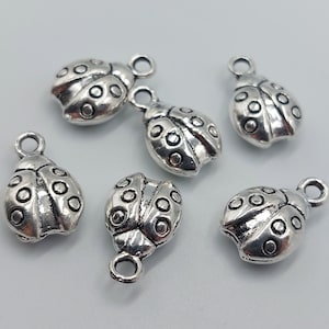 10 Ladybug Charms in Silver Tone - (Doublesided ladybird pendant goodluck Coccinella beetle charm gift) - D27A