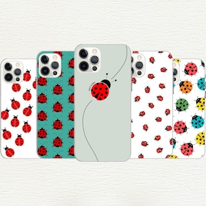 May include: Set of five iPhone cases featuring different ladybug designs. One case has a single ladybug with the text "Keep Going" on a light blue background. The other four cases feature repeating ladybug patterns in red, black, and white on a white, blue, or black background.