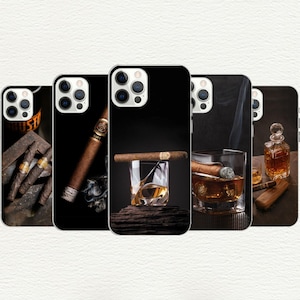May include: Four different iPhone cases with a black background and images of cigars, a glass of whiskey, and a bottle of liquor.