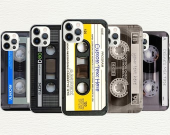 May include: Five smartphone cases featuring retro cassette tape designs. The cases display various labels including Sony, TDK, Ampex with Custom Text Here, Position Chrome, and Celine's Mix Tape. Each case has a cutout for a triple-lens camera system.