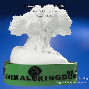 May include: A white sculpture of the Tree of Life from Disney's Animal Kingdom, set on a green base with the park's logo. The sculpture is detailed and stands out against a blue background. The text "Animal Kingdom" is visible on the base.