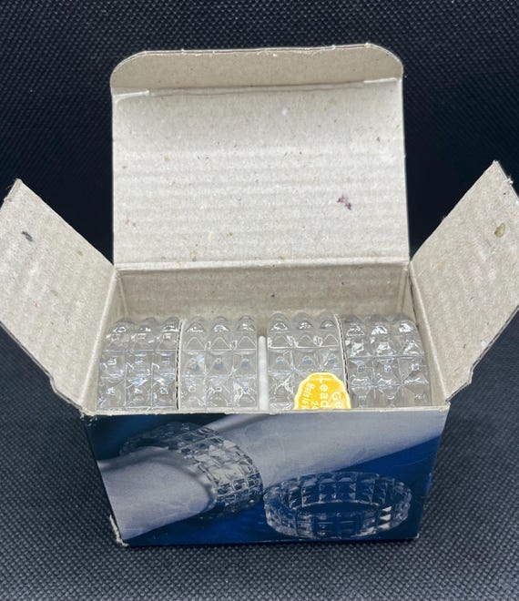 Vintage set of four diamond point cut crystal napkin rings Made in Western Germany original box