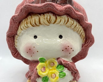 Vintage Kotobuki pink ceramic coin bank girl with flowers bonnet bow no plug