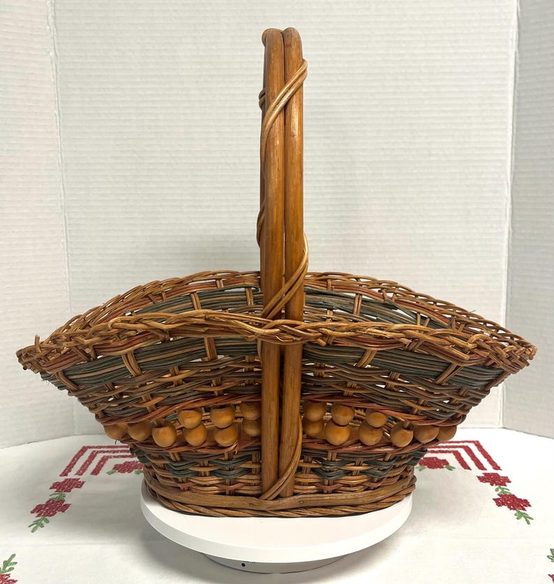 Vintage 70’s Wicker Rattan Woven Gathering Basket Wooden Beads With Handle And Wooden Base, vintage basket