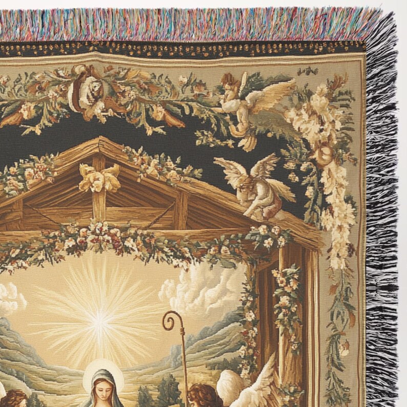 May include: A tapestry depicting the nativity scene with Mary, Joseph, and the baby Jesus in a stable. Angels are flying above the stable, and a bright star shines in the sky. The tapestry has a dark blue background with gold and brown accents.
