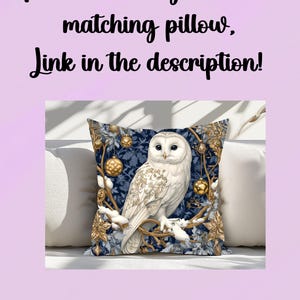 May include: A white owl with gold accents sits on a branch with blue and gold leaves. The owl is perched on a blue and gold throw pillow.