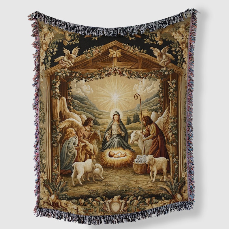 May include: A woven tapestry depicting the Nativity scene with Mary, Joseph, and the baby Jesus in a manger. Angels and sheep surround the manger, and a star shines brightly above. The tapestry is framed by a wooden archway and has a fringed border.
