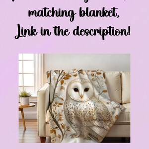May include: A white owl with brown and gold markings sits on a branch with white flowers. The owl is on a white and brown throw blanket. The text "Please visit my store for matching blanket, link in the description!" is above the image.