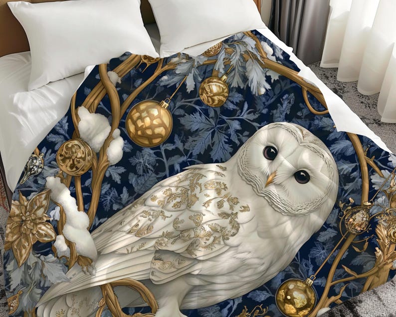 May include: A white owl with gold accents sits on a branch with blue and gold leaves. The owl is surrounded by gold ornaments and snow. The background is a dark blue.