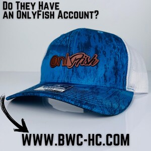 May include: A blue and white camouflage trucker hat with a brown leather patch that says "OnlyFish" on it. The hat has a white mesh back and a curved brim. The text "WWW.BWC-HC.COM" is written below the hat.