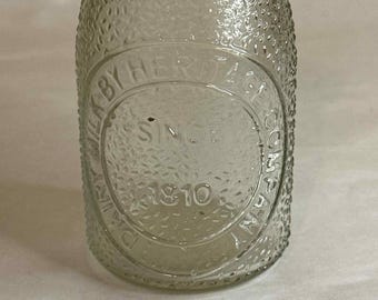 Vintage fles zuivelmelk Heritage Company fles met reliëf, halve pint