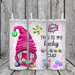 May include: Three pink glitter tumblers with a pink gnome design and the text "This is my lucky cup" with bingo cards and balls.