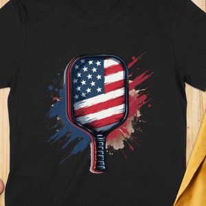 Patriotic Pickleball Shirt - American Flag Design Paddle Art, Unisex & Women's Relaxed T-Shirt, Black Glossy Mug, Hoodie, Sweatshirt