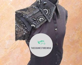 May include: Black short-sleeved shirt with a sequined shoulder and a large embellished collar. The collar features black and white rhinestones and a black horse head logo with the text "THEEQUINESTOREINDIA".