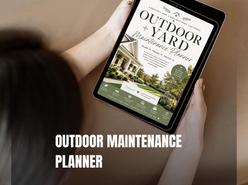 May include: A digital tablet displaying an Outdoor + Yard Maintenance Planner. The screen features a photograph of a house with a manicured lawn, green accent bars, and text including "Plan it. Track it. Enjoy it." and "Beautiful Outdoor Made of Mind."
