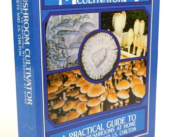 May include: A blue book cover with the title "The Mushroom Cultivator: A Practical Guide to Growing Mushrooms at Home" by Paul Stamets and J.S. Chilton. The cover features a collage of different types of mushrooms.