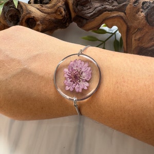 Purple flower resin bracelet with sliding clasp