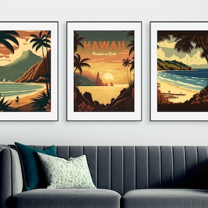 May include: Three framed vintage travel posters with a tropical theme. Each poster features a beach scene with palm trees, a sunset, and the text "HAWAII Paradise on Earth".