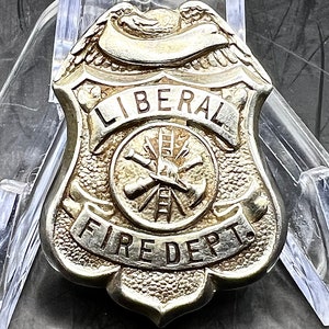 Vintage 1950’s Liberal Kansas Fire Department Badge Shield Stamped C.D. Reese New Warren St. York NY.