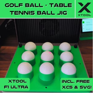May include: A green 3D printed jig with eight slots for holding golf balls or tennis balls. The jig is labeled "XTOOL F1 ULTRA" and "INCL. FREE XCS & SVG!"