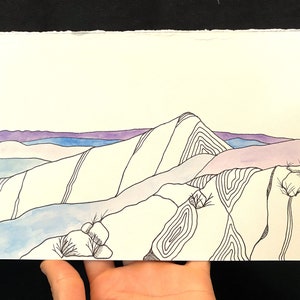 May include: A watercolor painting of a mountain range with purple, blue, and white hues. The mountains are outlined in black ink and have a layered, textured appearance.