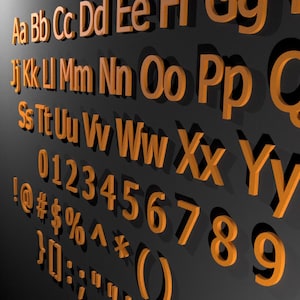 May include: Orange 3D alphabet letters, numbers, and symbols against a dark grey background. The letters are in uppercase and lowercase, with a shadow effect. Includes punctuation marks and mathematical symbols.