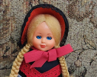 Vintage Celluloid Doll late 1950s or Early 1960s in Red Dress with Black Trim