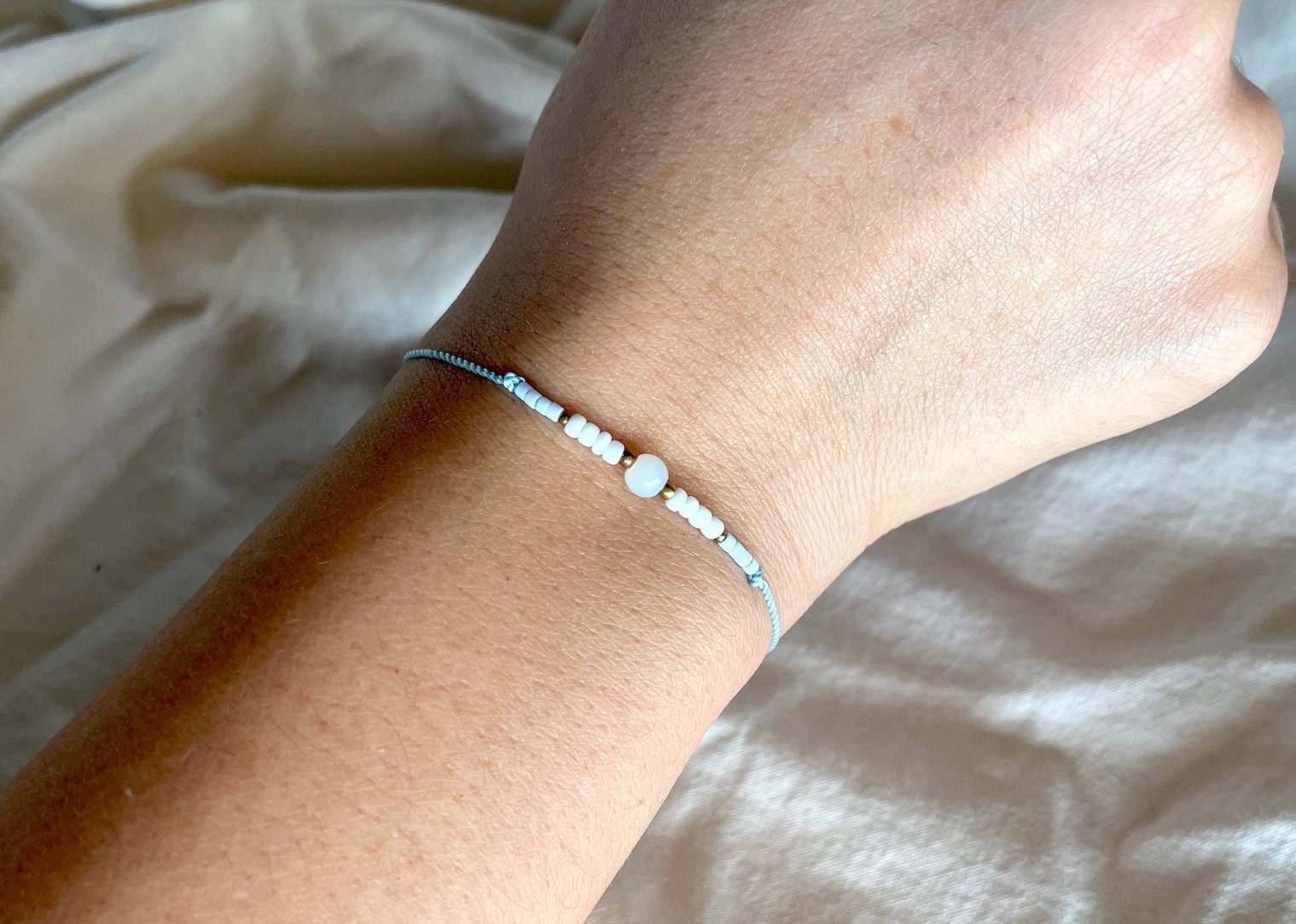 Louis Vuitton White/Blue Beaded Bracelet - Yoogi's Closet