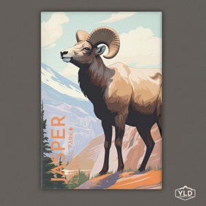 May include: A vintage-style illustration of a bighorn sheep standing on a mountainside with the text "Jasper National Park Alberta" in orange and white lettering.