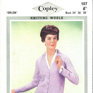 May include: A lavender cardigan with a button-up front and a V-neck. The cardigan is made of 'Orlon' knitting wool. The image includes the text 'Copley Knitting Wools' and '107 6d'.