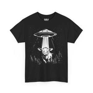 Trending Cow abducted by UFO graphic Unisex Heavy Cotton Tee, funny shirts, ufo gifts, uap accessories, cartoon gift, alien tee, cow shirt