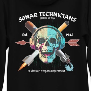 May include: Black hoodie with a colorful skull graphic and the text "SONAR TECHNICIANS SECOND TO GOD Est. 1943 Saviors of Weapons Department".