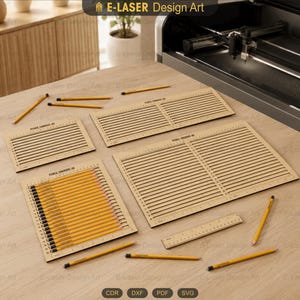 May include: Three rectangular light-colored wooden pencil engraving jigs with horizontal slots and numbered markings. One jig is filled with yellow pencils. A small wooden ruler and several loose yellow pencils are arranged nearby.