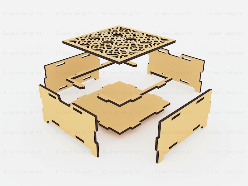 Puede incluir: Un kit de caja de madera de color marr&oacute;n claro desmontado con paneles planos y ranuras cortadas con l&aacute;ser para su montaje. El panel superior muestra un intrincado patr&oacute;n sim&eacute;trico recortado, mientras que la base y los laterales son lisos.