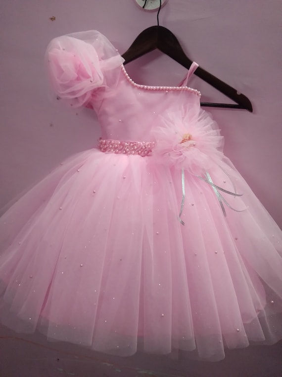 Light pink sleeveless baby party gown with rhinestone neckline and floor  length tulle skirt
