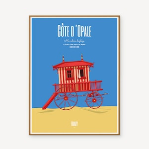 Op de afbeelding: Een rood-wit gestreept strandhuisje op wielen met een blauwe lucht op de achtergrond. De tekst op de poster luidt "Côte D'Opale" en "Ma cabine de plage IL ETAIT UNE FOIS LE NORD COLLECTION".