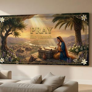 Può includere: Stampa artistica su tela incorniciata raffigurante una scena biblica con il testo "PRAY like Hannah". L'opera presenta una donna in preghiera, un paesaggio con un fiume e un tramonto. La cornice è decorata con elementi floreali.