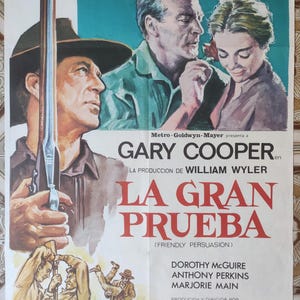 Peut inclure: Affiche de film vintage pour "La Gran Prueba" (Friendly Persuasion) avec Gary Cooper. L'affiche présente des illustrations des acteurs et du texte en espagnol. L'affiche est en couleur et porte le logo MGM.