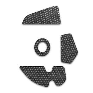 Puede incluir: Un conjunto de almohadillas adhesivas negras texturizadas con un patrón ovalado repetitivo. El conjunto incluye un anillo, dos formas irregulares y una forma curva, todo sobre un fondo gris oscuro y un patrón gris claro.