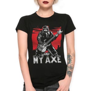 May include: Black t-shirt with a graphic of a man with a beard playing a guitar. The text "and my axe" is printed below the graphic.