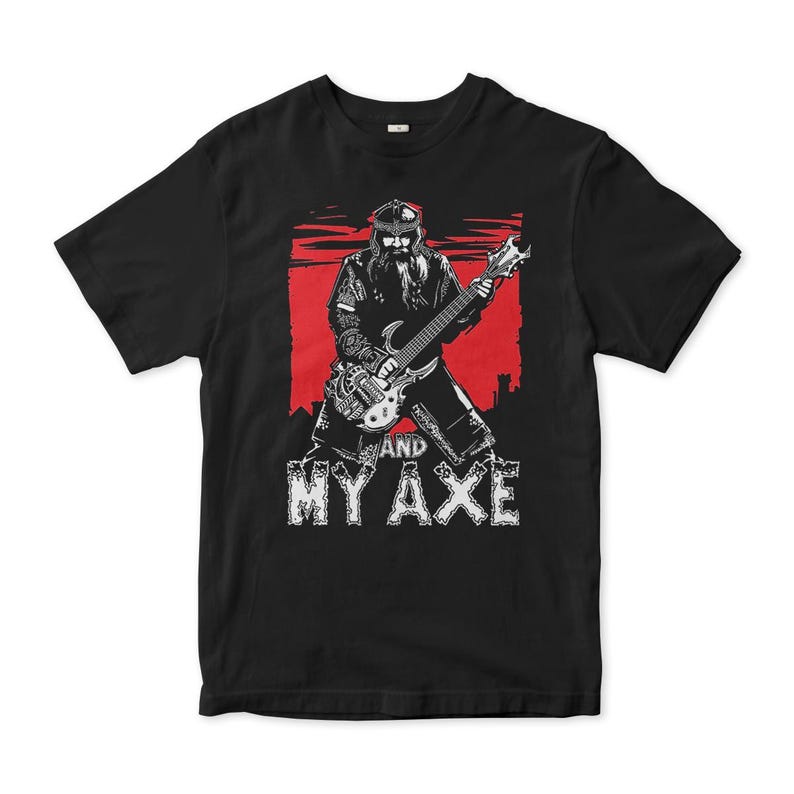 May include: Black t-shirt with a graphic of a person with a long beard playing a guitar and the text "And My Axe".