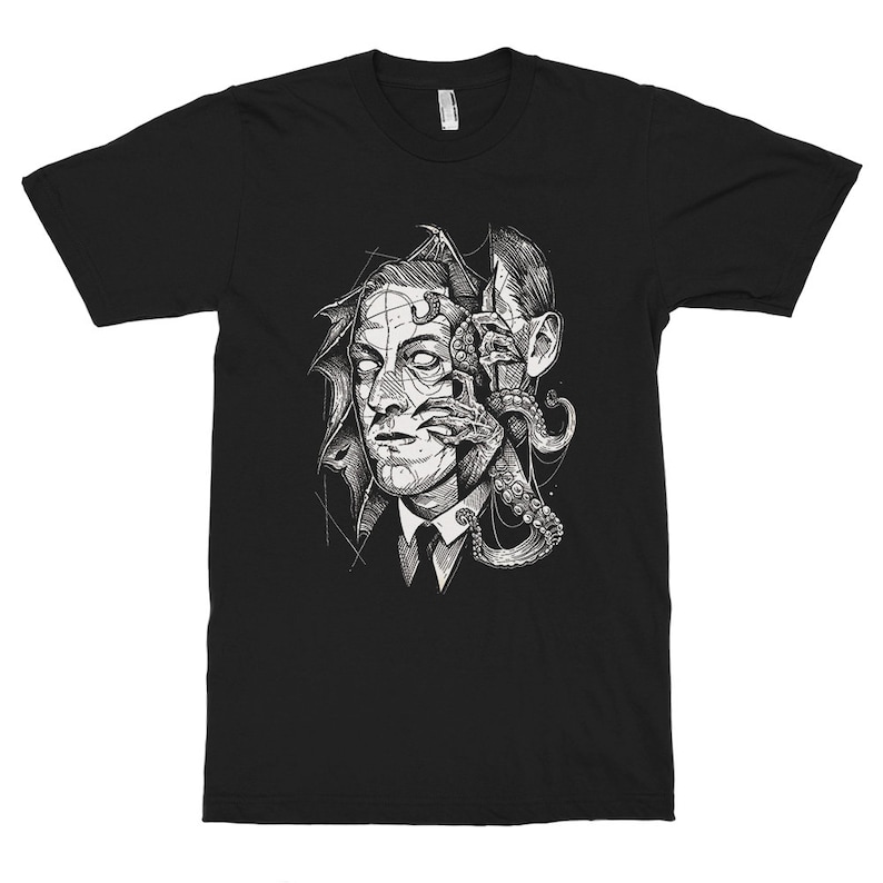 May include: Black t-shirt with a graphic print of a man's face with an octopus tentacle coming out of his eye.