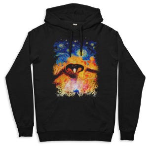 May include: Black hooded sweatshirt featuring a colorful graphic design. The design depicts a stylized image of a creature against a starry night sky, with vibrant blues, oranges, and yellows. The sweatshirt has a drawstring hood and a front pocket.