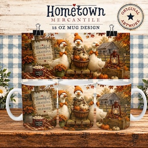 May include: A white ceramic mug featuring a fall-themed illustration of three geese wearing orange hats and scarves. The design includes a sign reading Thankful Grateful & Blessed, a basket of pumpkins, a lit lantern, and autumn leaves.