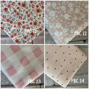 May include: Four fabric swatches labeled FBC 21 through FBC 24. FBC 21 features a white background with red floral patterns. FBC 22 has a light pink background with white flowers. FBC 23 shows a pink and white gingham check. FBC 24 is light pink with black polka dots.