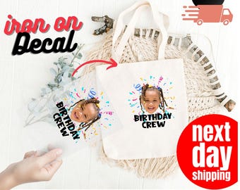 May include: A white tote bag and a clear iron-on decal featuring a child's photo and the words "BIRTHDAY CREW" with confetti. The words "iron on decal" and "DTF TRANSFER" are also visible.