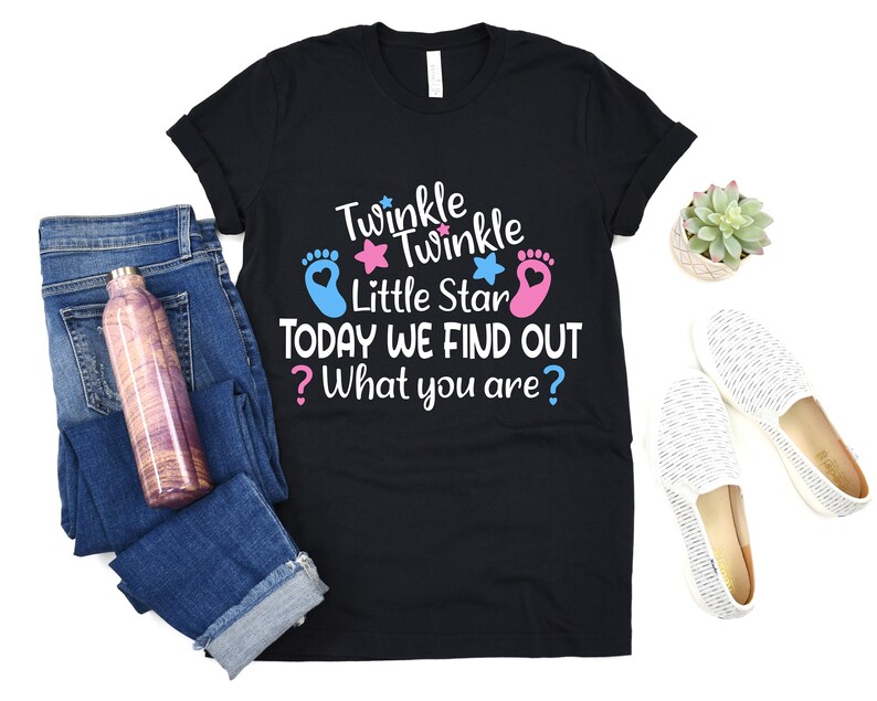 May include: Black t-shirt with the text "Twinkle Twinkle Little Star Today We Find Out ? What you are?" with a pink and blue footprint and star graphic.