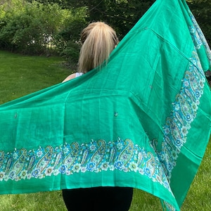 Very light green silk neck or bikini scarf with blue/brown  floral/paisley pattern