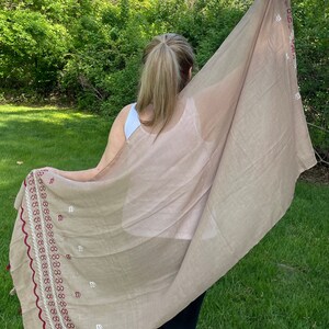 Very beautiful beige color- very soft cotton scarf with white and maroon embroidery pattern
