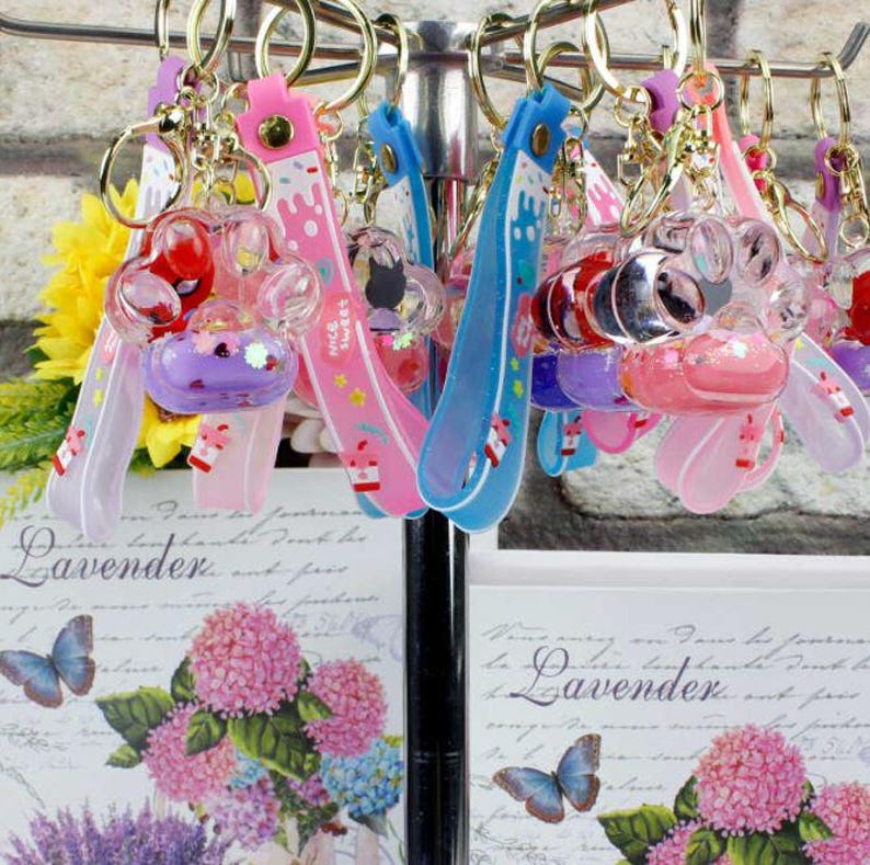 Small Desktop Keychain Luxury Mini Claw Design Silicone Bracelet Water Liquid Filled Keychain ...